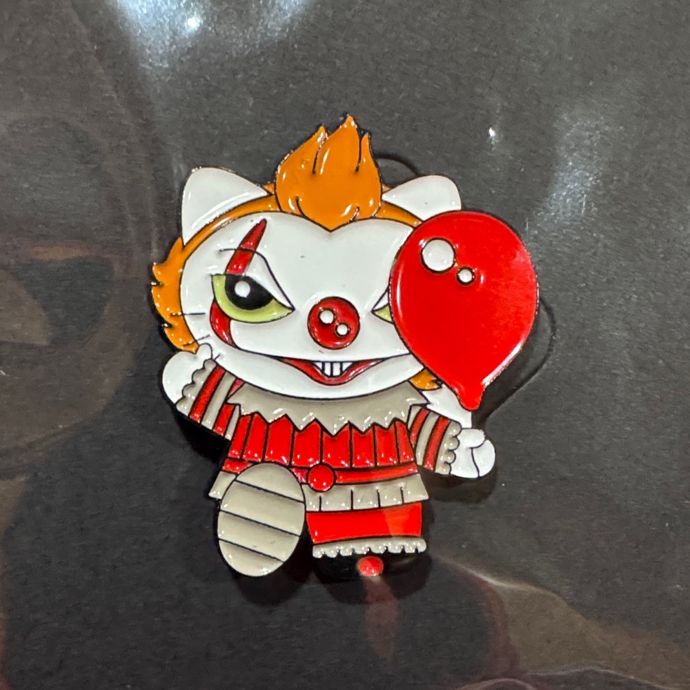 3 for $15 on select pins 
Cute Clown Cat Enamel Pin with Red Balloon